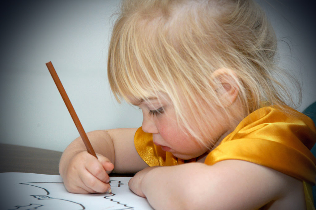 healthy child making an art drawing