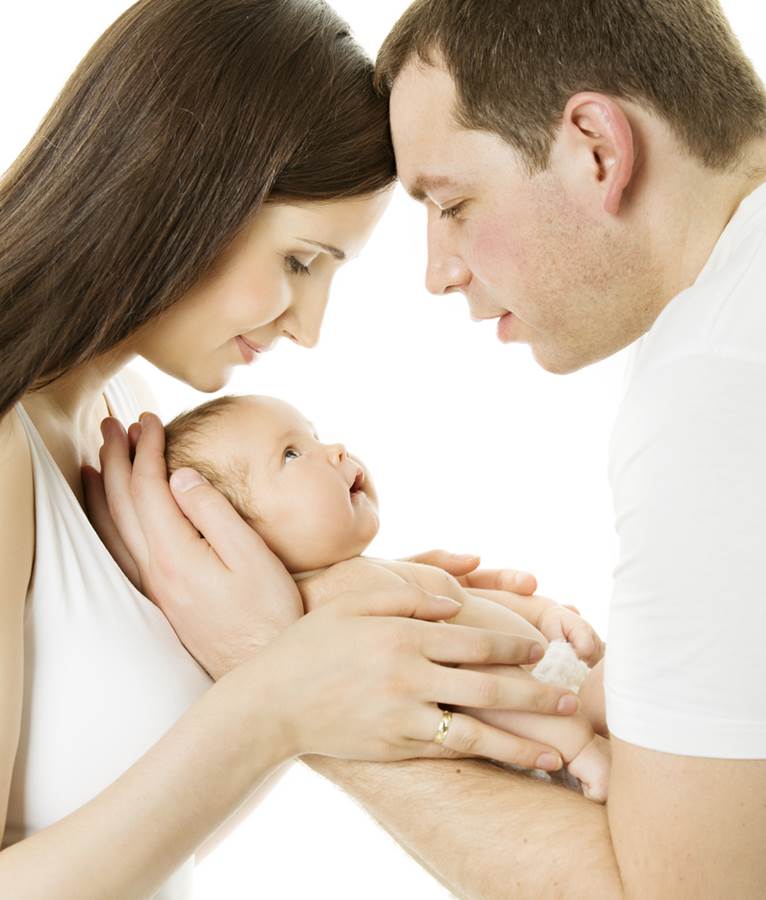 parents enjoying their new baby