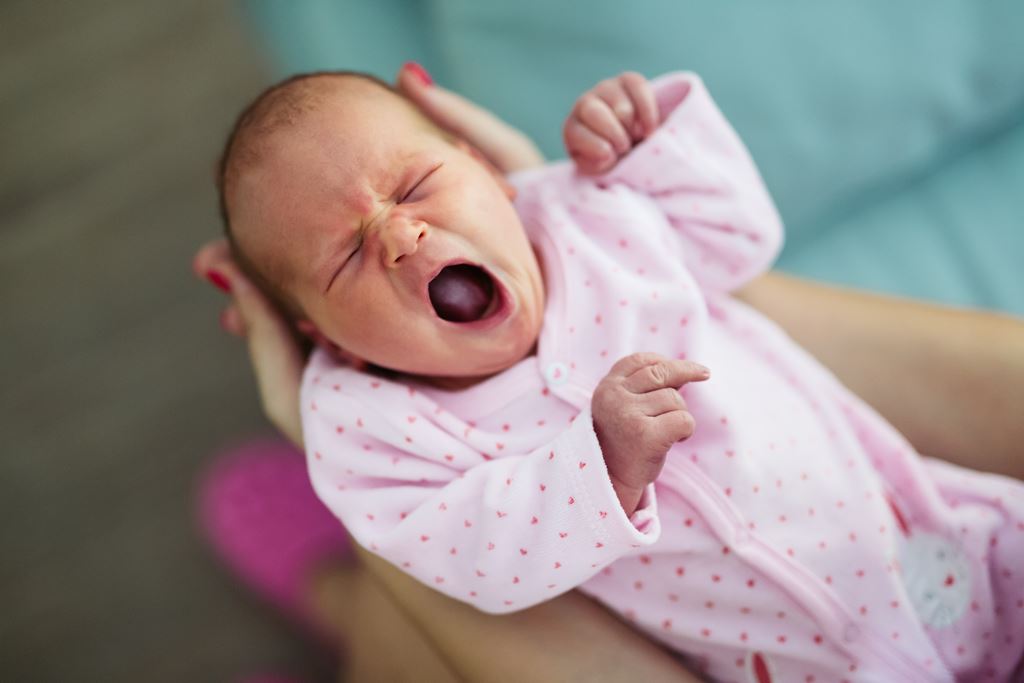 yawning newborn