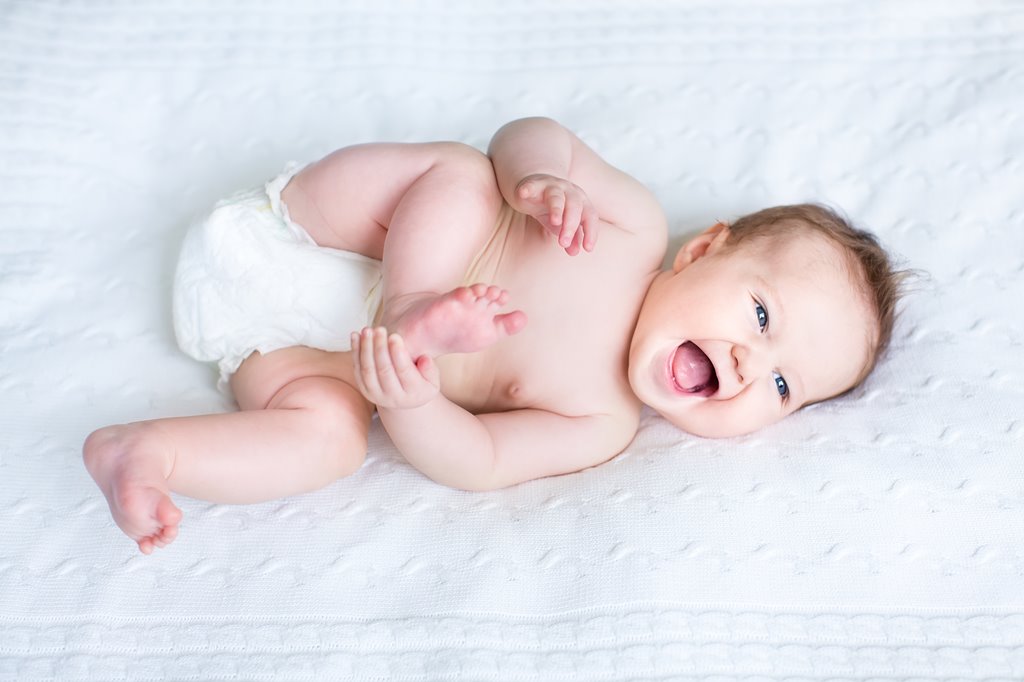 happy baby boy in diaper