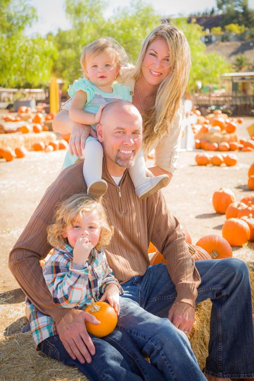 family at a pumpkin patch