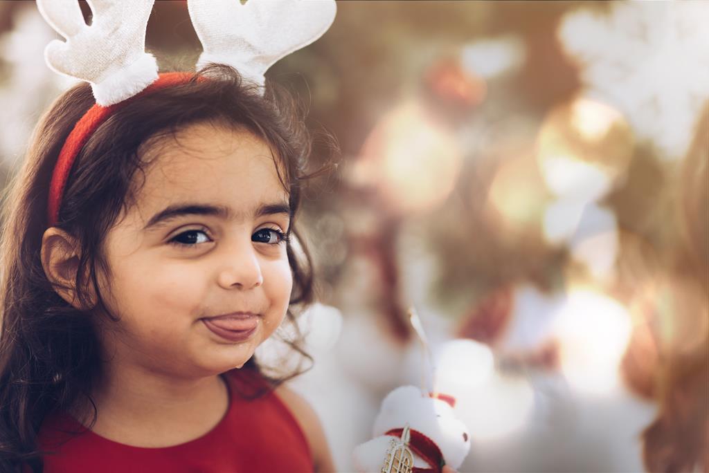 Little girl in holiday headband